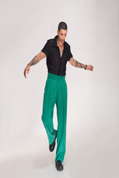 men black shirt green pent