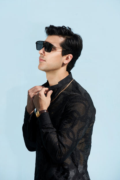 Men black kurta and white trousers