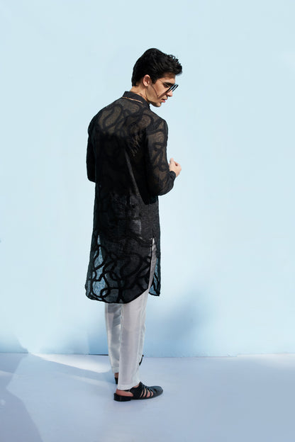 Men black kurta and white trousers