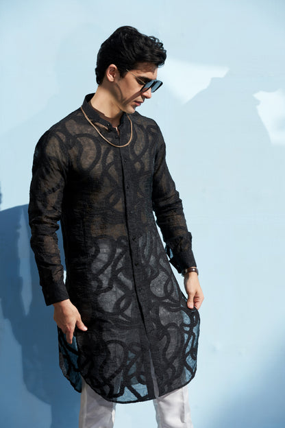 Men black kurta and white trousers