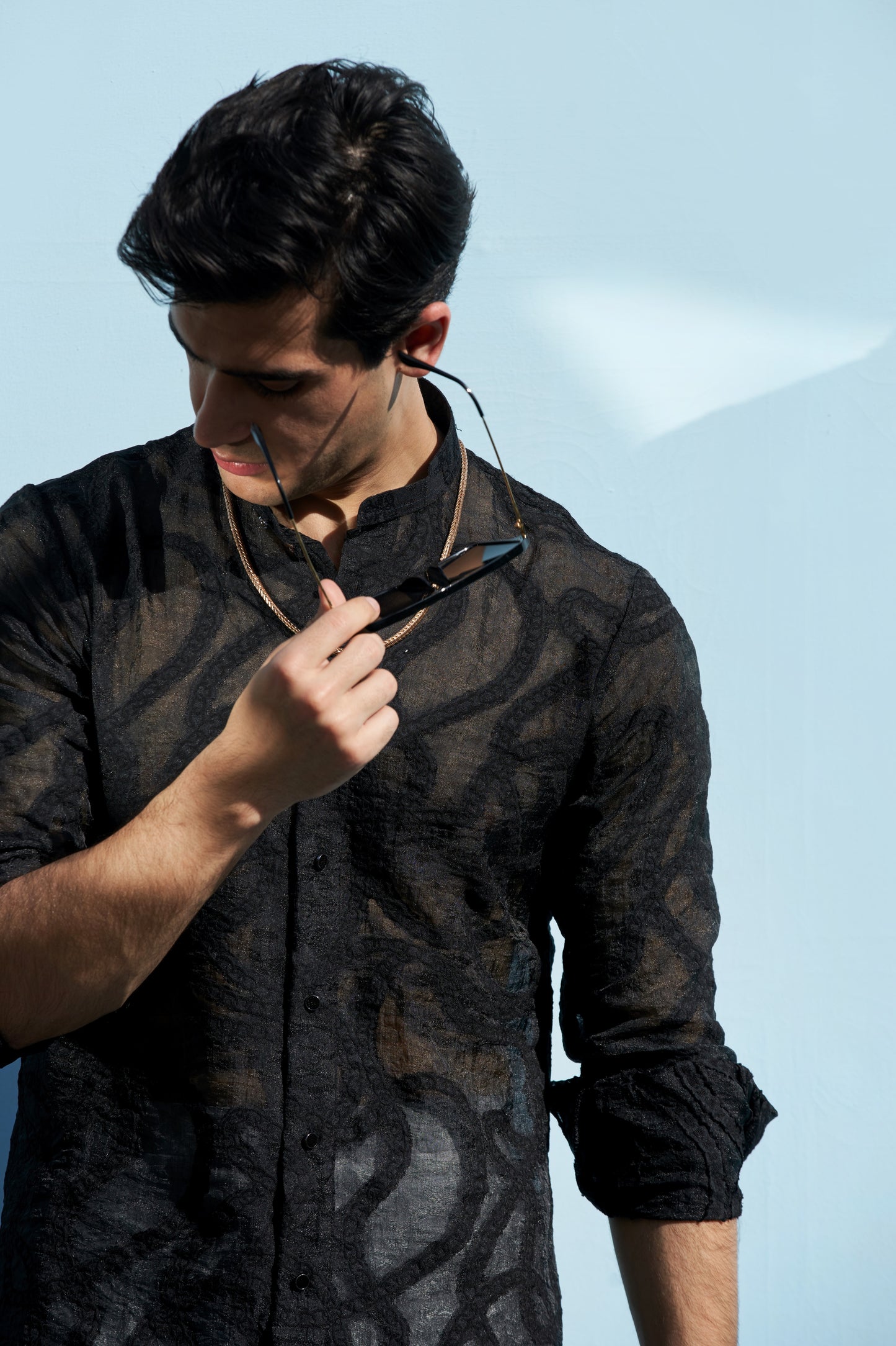 Men black kurta and white trousers