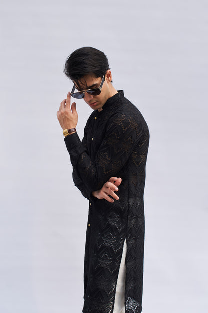 Men black kurta and white trousers