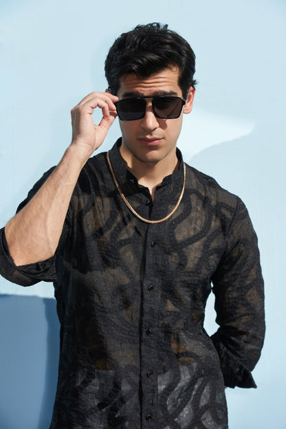 Men black kurta and white trousers