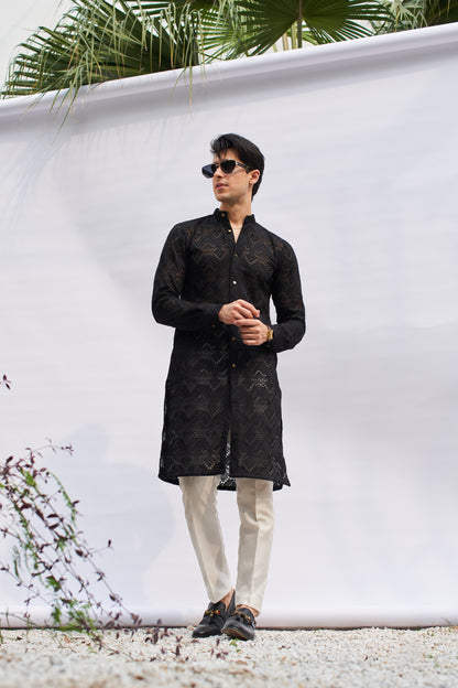 Men black kurta and white trousers