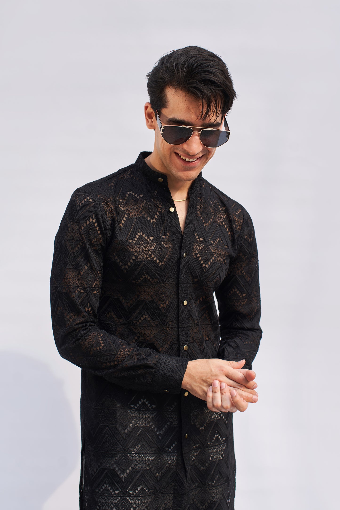 Men black kurta and white trousers