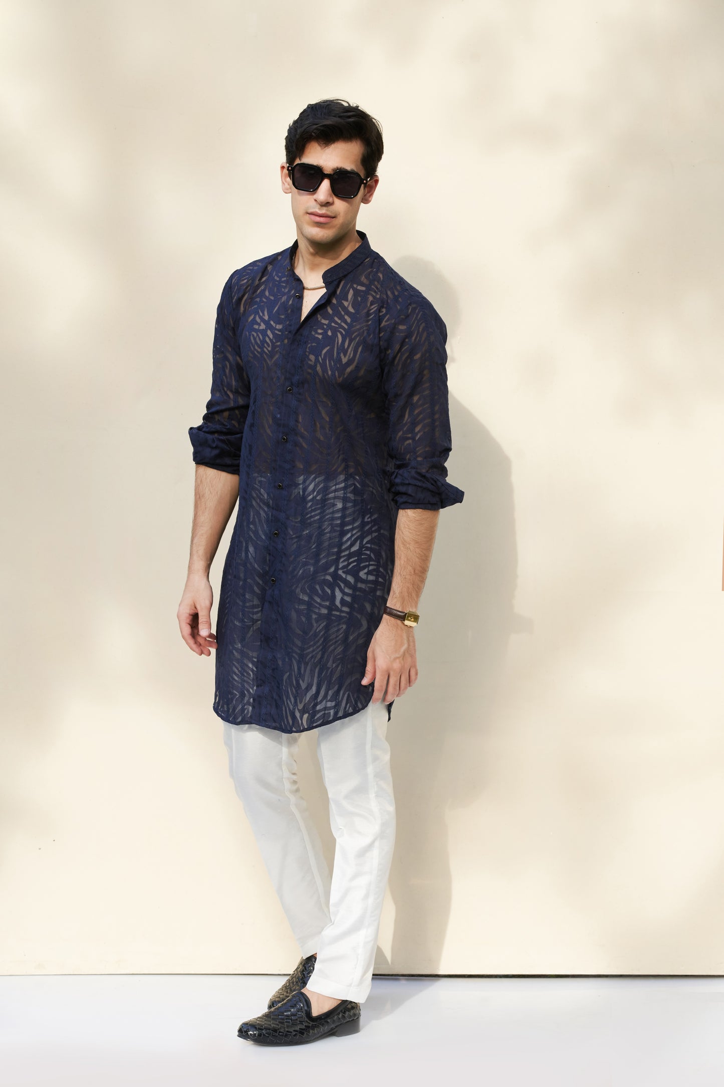 Blur kurta and white trousers